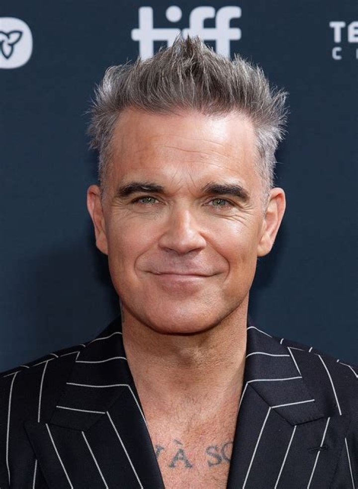 A tour of Robbie Williams' tattoos and their meanings