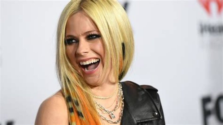 Avril Lavigne shares her tour essentials whilst looking phenomenal in crop top