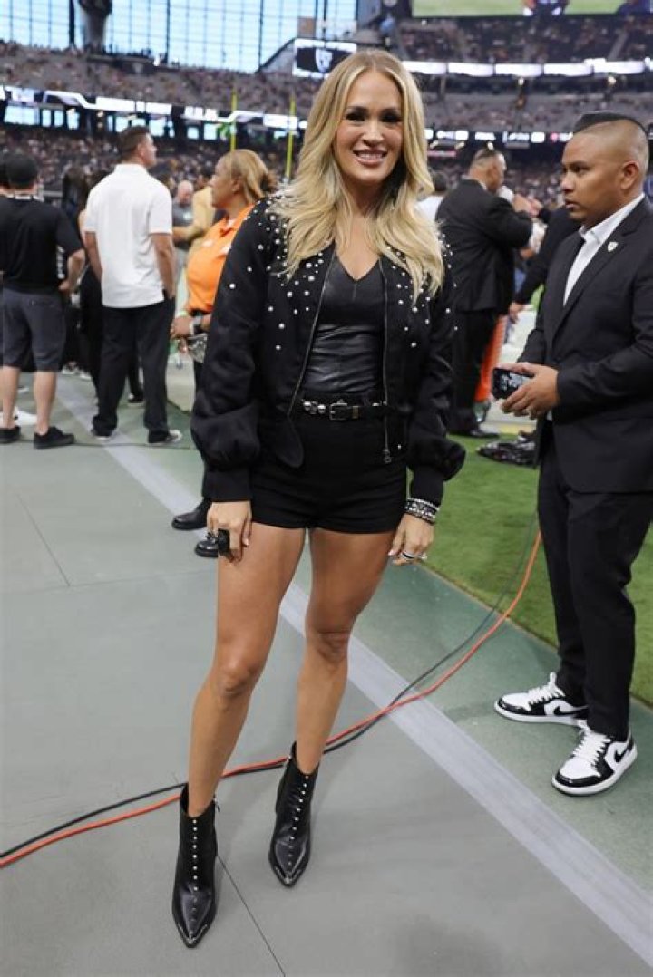 Carrie Underwood's leather top and micro-shorts get fans talking in saucy photos
