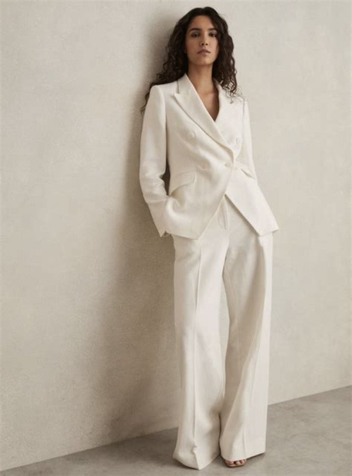 Emma Willis nails romantic power dressing in Gucci's £2,600 trouser suit