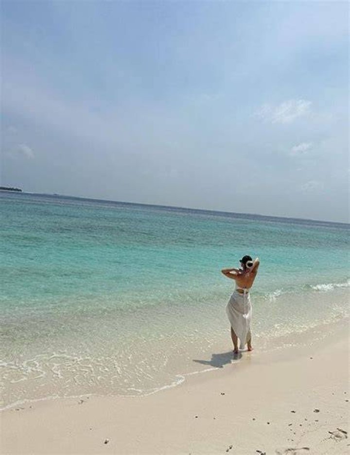 Lily James is a goddess in beach babe bikini