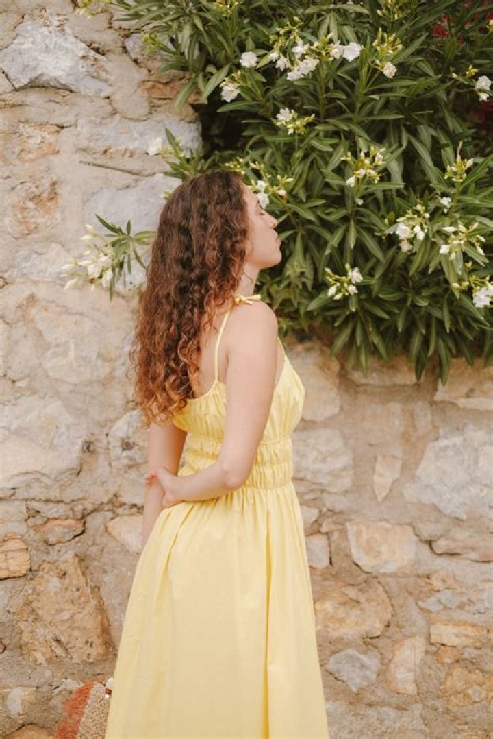 Mandy Moore rocks sunshine yellow dress as she teases new music