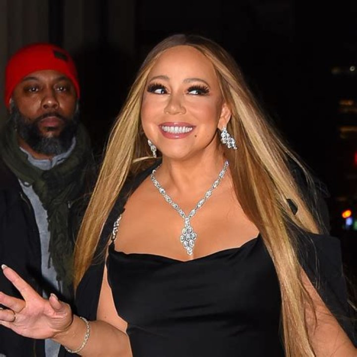 Mariah Carey dons stunning sequined figure-hugging gown for 55th birthday on the water
