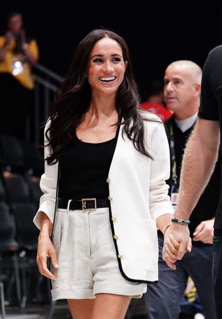 Meghan Markle epitomises luxury in high-rise shorts and $1,350 Chanel ballet pumps