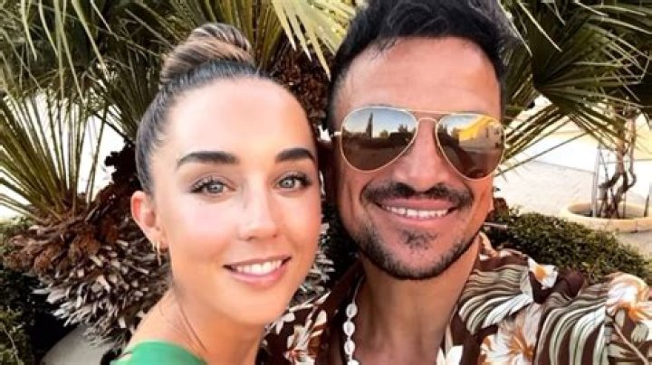 Pregnant Emily Andre delights fans with bare baby bump photo from beach holiday