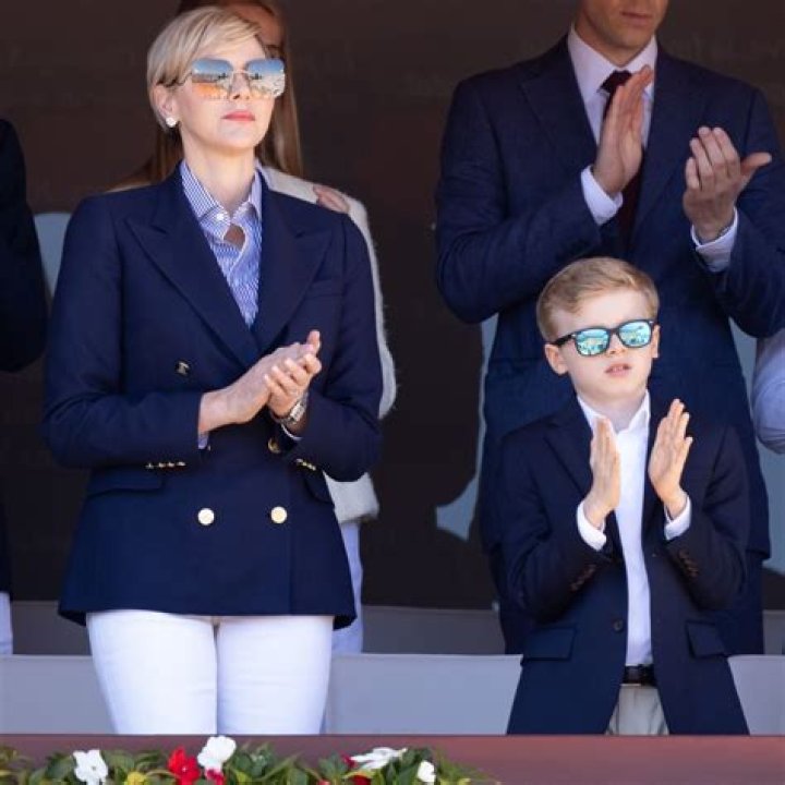 Princess Charlene models white skinny jeans and sweeping blonde hair alongside lookalike son, 9