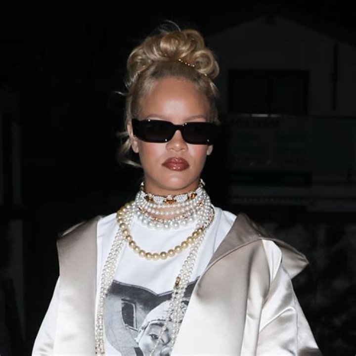 Rihanna sizzles in purple lingerie as she showcases her tattoos in intimate bedroom video