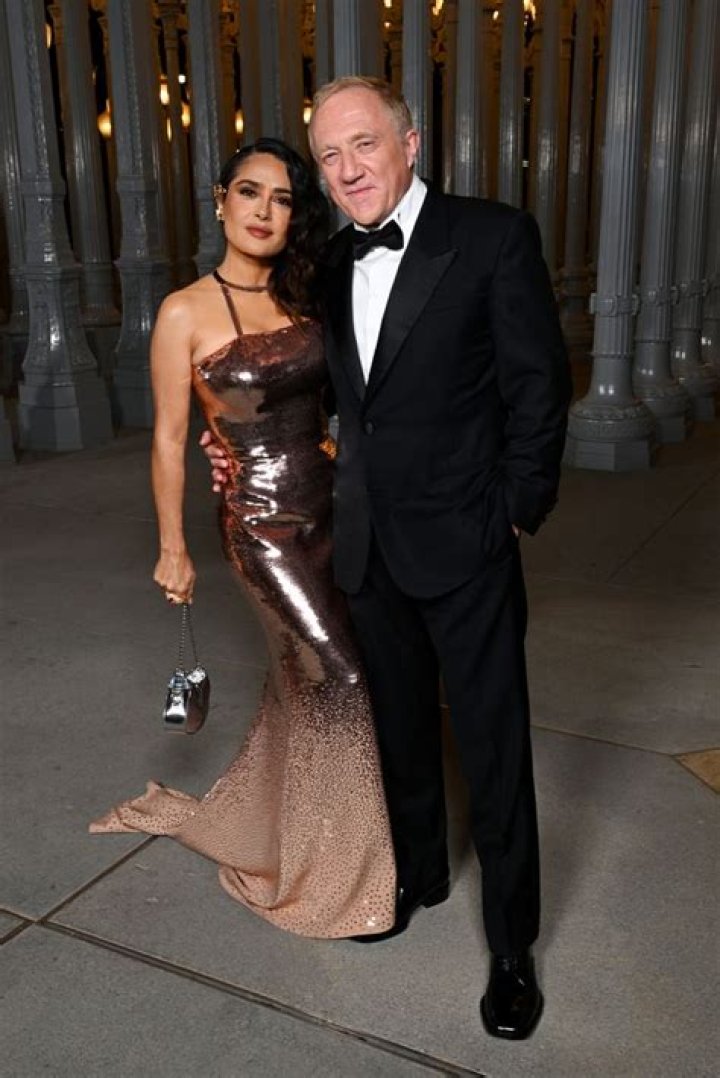 Salma Hayek barely contains herself in plunging wedding lingerie