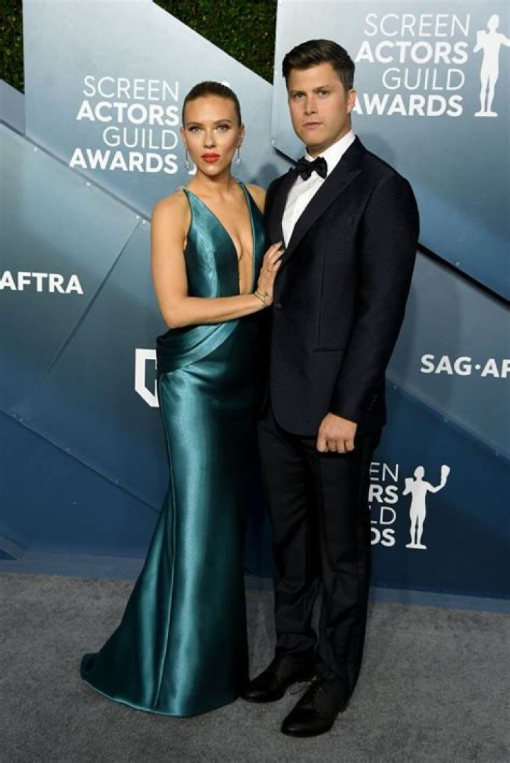 Scarlett Johansson sets pulses racing as she showcases her incredible physique in tight blue dress