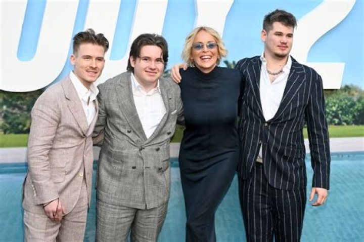 Sharon Stone's handsome son Roan, 23, unveils tattooed chest in rare photos